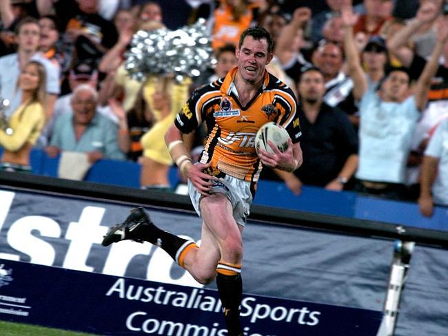 Pat Richards about to score a try after Benji Marshall made an incredible flick pass in the 2005 Wests Tigers v North Queensland Cowboys grand final. Picture: Craig Wilson 