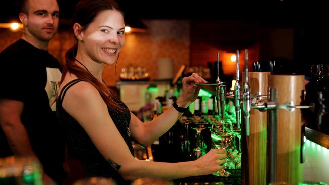 Hidden Bars- Back Alley Sally's bartenders Jack Stapleton and Kat Humphries, pouring wine form the taps. Picture: Nicole Cleary