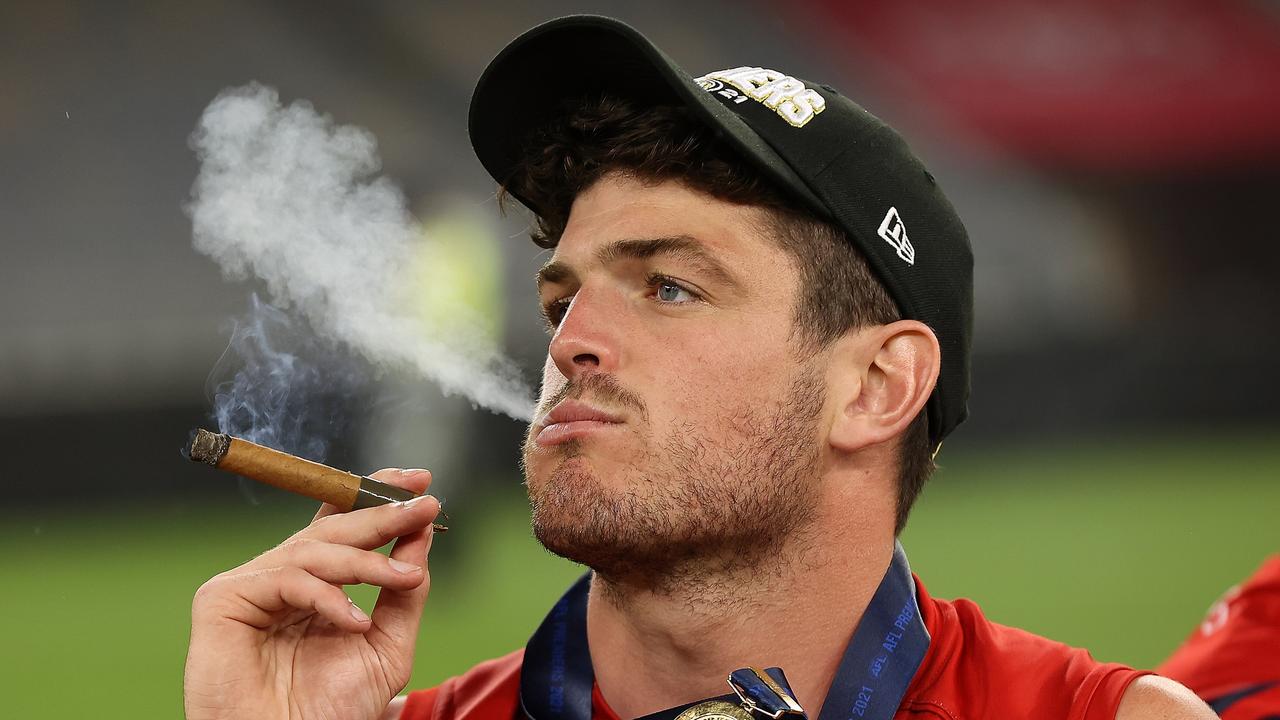 Now that’s a victory cigar. (Photo by Paul Kane/Getty Images)
