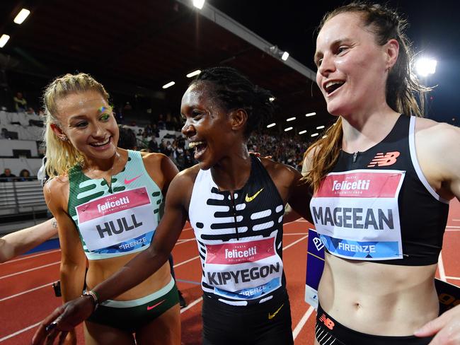 FLORENCE, ITALY - JUNE 02: Faith Kipyegon of Team Kenya interacts with Jessica Hull of Team Australia and Ciara Mageean of Team Ireland after victory in the Women's 1500m during the Golden Gala Pietro Mennea, part of the Diamond League series at Rodolfi Stadium on June 02, 2023 in Florence, Italy. (Photo by Valerio Pennicino/Getty Images)