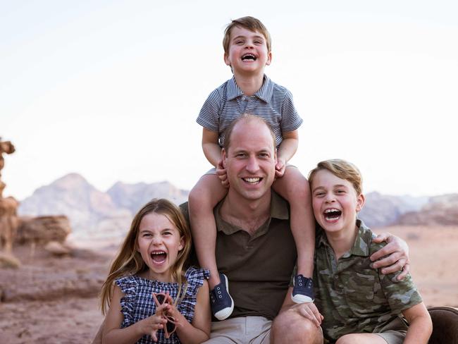 Prince William, Duke of Cambridge, posing for a photograph with his children, Princess Charlotte, Prince Louis and Prince George. Picture: Kensington Palace/AFP