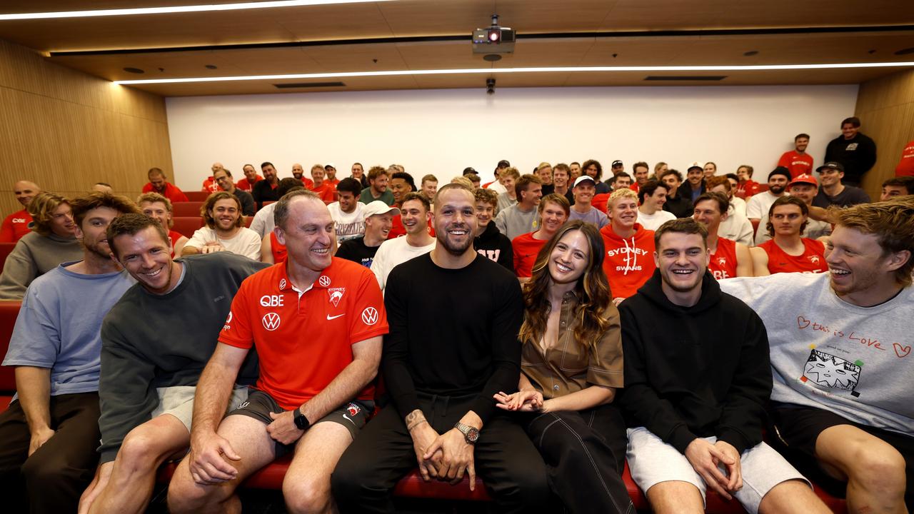 Franklin with coach John Longmire and his wife Jesinta after addressing the players. Picture: Phil Hillyard