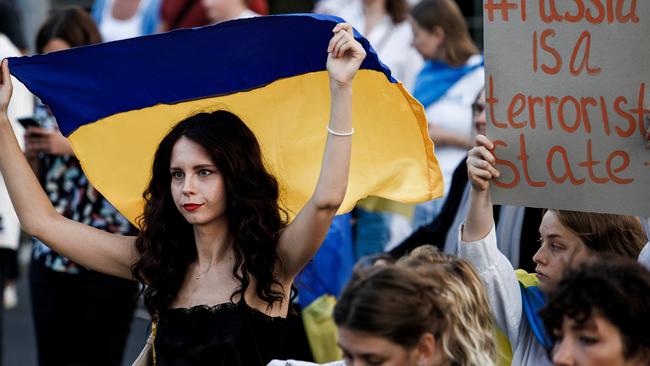 Demonstrators, mostly Ukrainians, march through the city as part of the Ukraine Freedom Parade on August 24 in Berlin. Picture: Carsten Koall/Getty Images