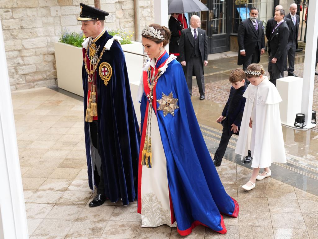 The Walses made a stunning entrance with Kate and Charlotte in matching headwear. Picture: Dan Charity – WPA Pool/Getty Images