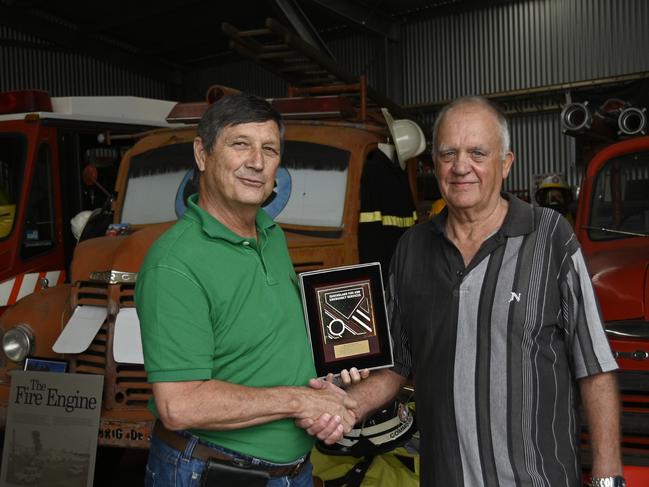 Former Fire Commissioner, Lee Johnson (left) presents a plaque Neville McCabe.  Presentation to former Millmerran and Toowoomba Fire Auxillary member, Neville McCabe, in recognition of service from 1976 to 2011. Picture: Bev Lacey