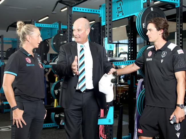 Port Adelaide Football Club unveiling its new high-performance centre. Port players, Janelle Cuthbertson and Connor Rose with PAFC Board Chairman David Koch, in the new gym. 10 February 2024. Picture Dean Martin