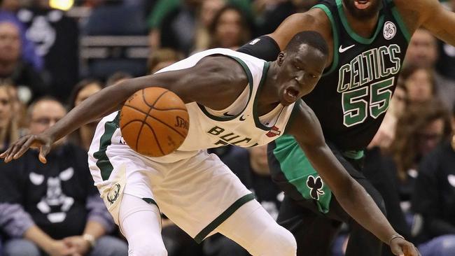 Thon Maker #7 of the Milwaukee Bucks looses control of the ball under pressure from Greg Monroe #55 of the Boston Celtics during Game Four of Round One of the 2018 NBA Playoffs at the Bradley Center on April 22, 2018 in Milwaukee, Wisconsin. NOTE TO USER: User expressly acknowledges and agrees that, by downloading and or using this photograph, User is consenting to the terms and conditions of the Getty Images License Agreement. Jonathan Daniel/Getty Images/AFP == FOR NEWSPAPERS, INTERNET, TELCOS &amp; TELEVISION USE ONLY ==