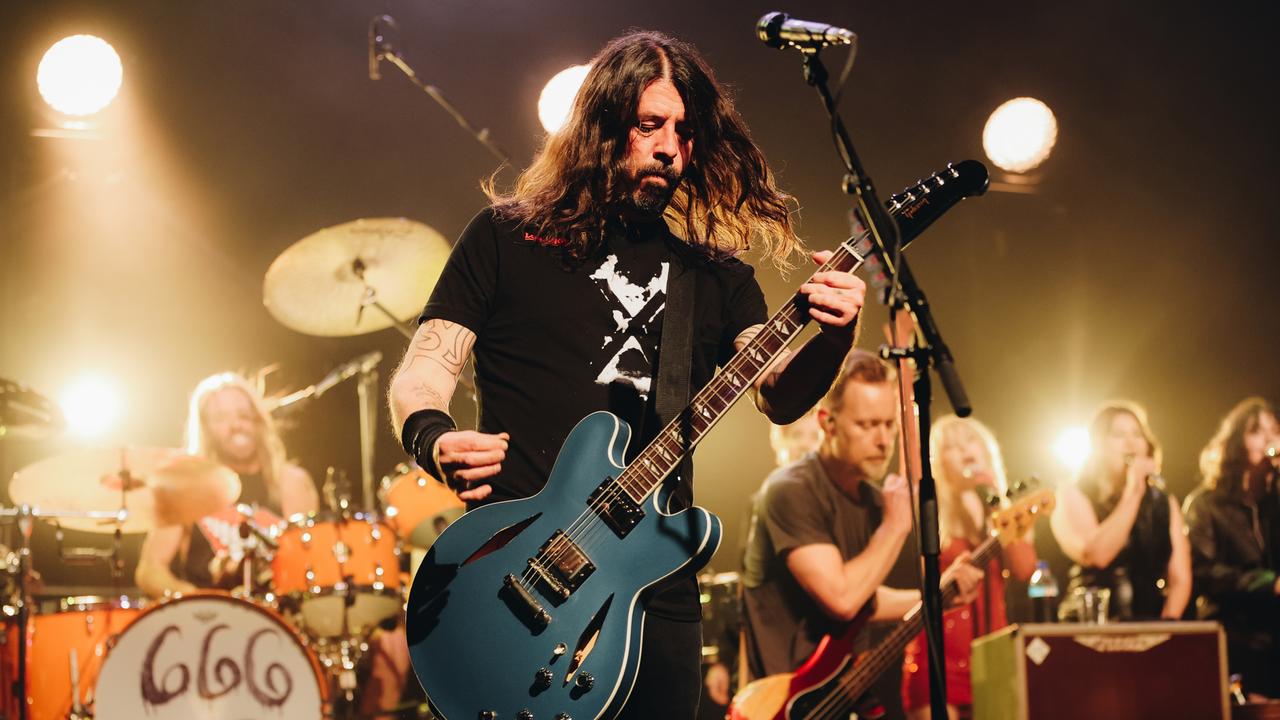 Taylor Hawkins, Dave Grohl and Nate Mendel of Foo Fighters performs onstage at the after party for the Los Angeles premiere of "Studio 666" at the Fonda Theatre on February 16, 2022 in Hollywood. Picture: Getty