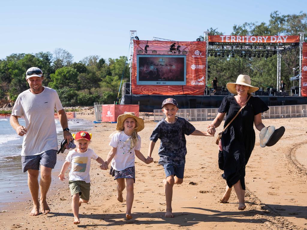 Joel, Liam, Kate, Ethan and Jenna Sargeant secured a front-row seat for the Territory Day festivities at Mindil Beach in Darwin. Picture: Pema Tamang Pakhrin