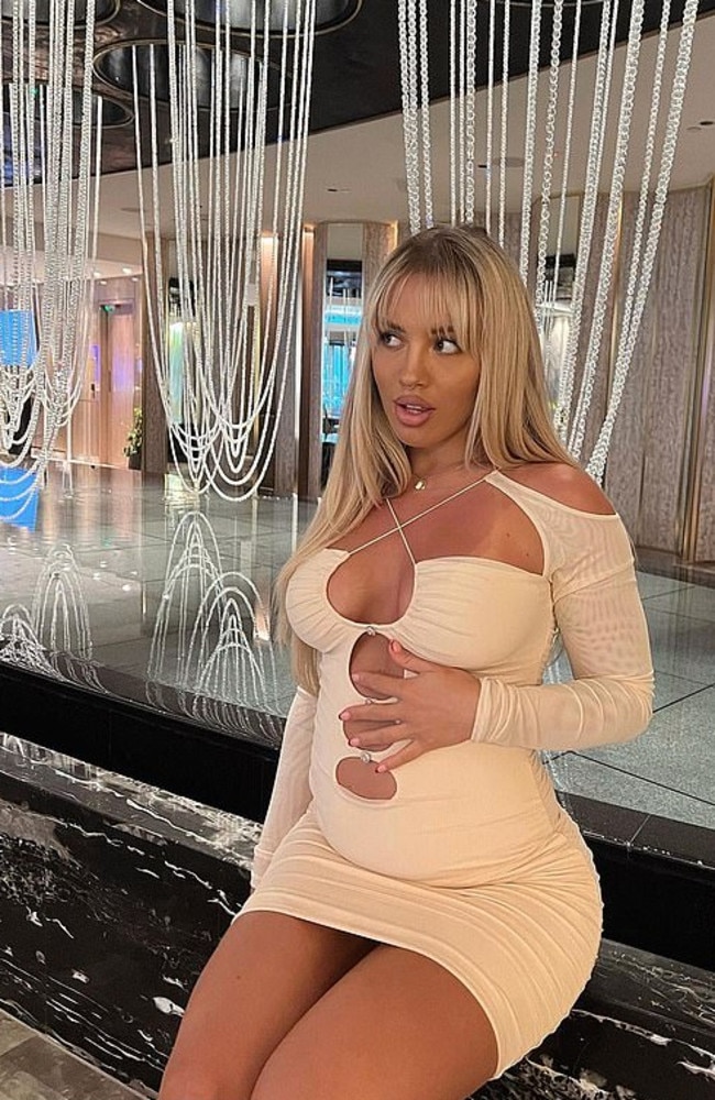 Tammy Hembrow, 27, flaunts her baby bump in a ‘stunning’ figure-hugging beige dress. Picture: Instagram/TammyHembrow