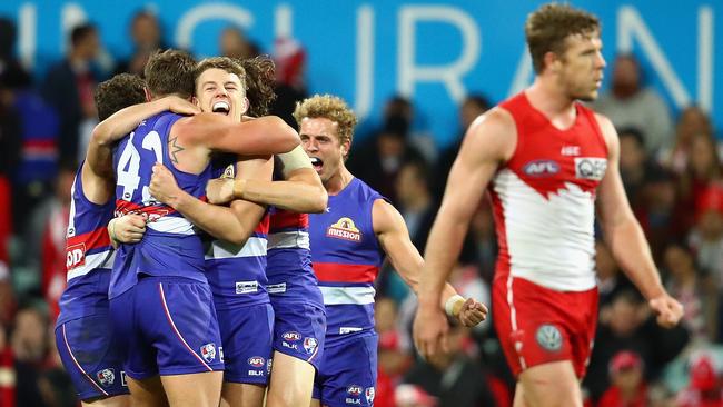 The Bulldogs celebrate the Round 15 win over Sydney at the SCG.