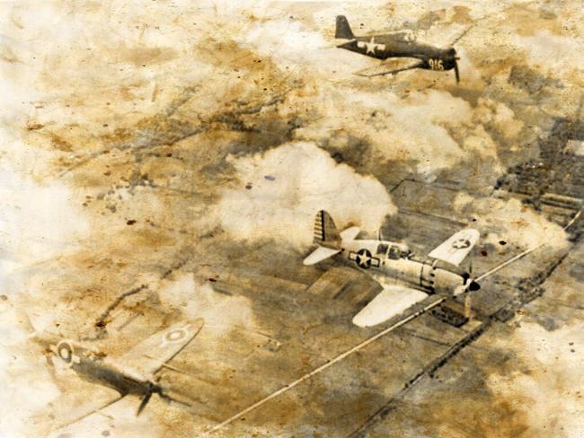 A Seafire, bottom left, flying with a captured J2 ‘Raiden’ and a USN Grumman Hellcat. Source: Imperial War Museum