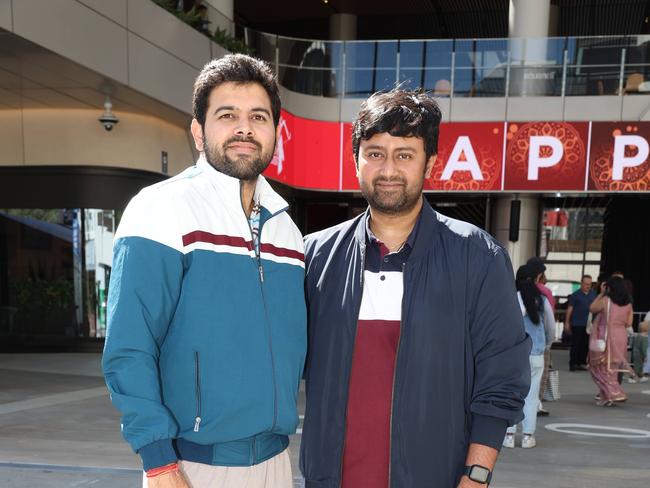 Sumit and Navadeep outside Marvel Stadium which hosted the Diwali festival on Saturday. Picture: Brendan Beckett