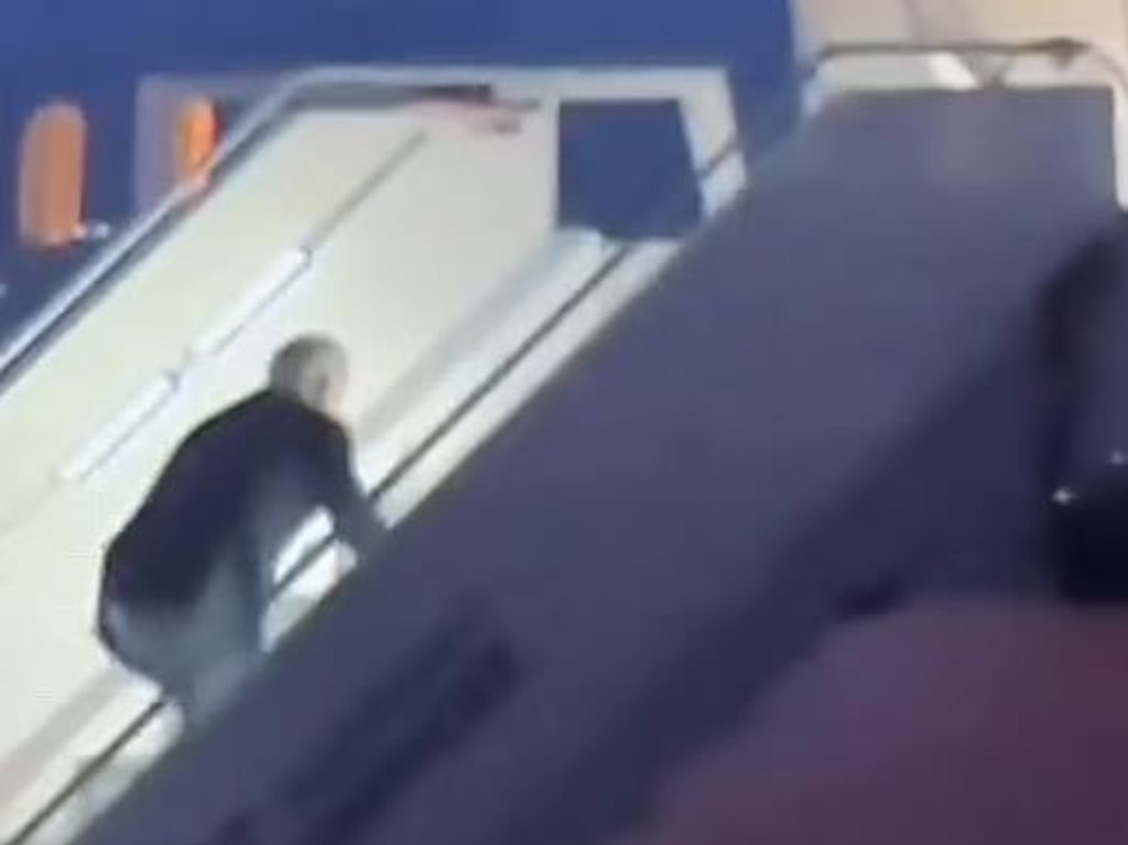 Joe Biden stumbles on the stairs of Air Force One.