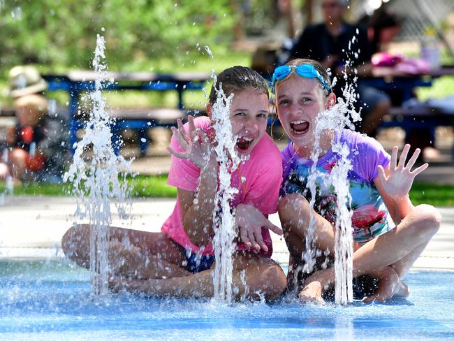 Sisters Chelsea and Alexandra Thiel cooling down at Burnside swimming pool. Picture: Mark Brake