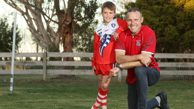 Former Cats premiership player, and current ruck coach Brad Ottens is also coaching his son Johnny's under-9 Ocean Grove team. Picture: Alison Wynd