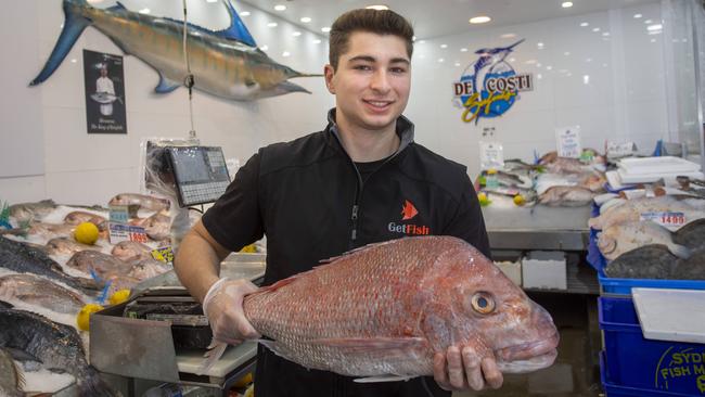 Mr Muollo with a large snapper. Picture: Quentin Jones.