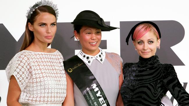 Jodie Anasta and Nicole Richie with the winner of Fashions on the Field at the 2015 Tooheys New Golden Slipper Day at Rosehill Racecourse.
