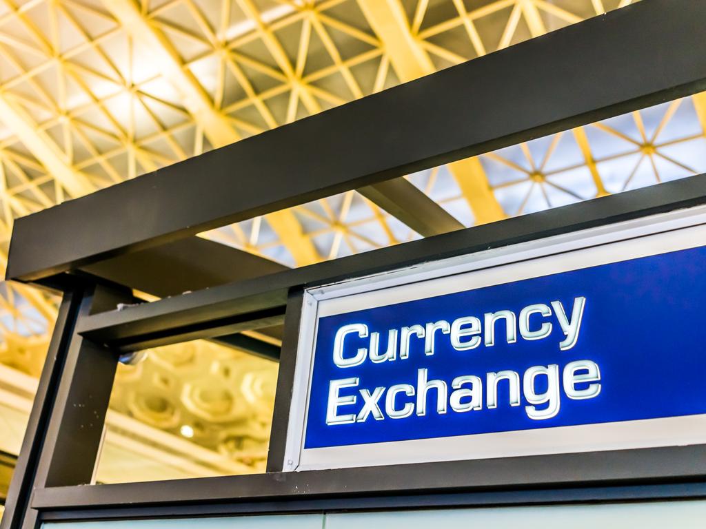 You'll get less bang for your buck by exchanging currency at the airport.