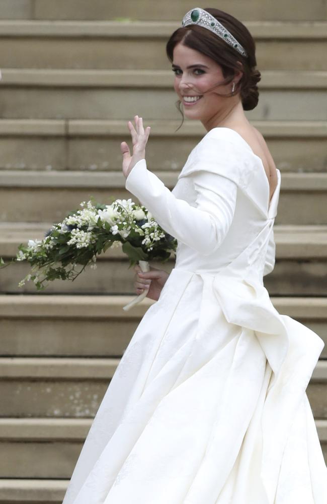 Princess Eugenie arrives with her father Prince Andrew for her wedding ceremony to Jack Brooksbank at St George’s Chapel, Windsor Castle, near London, England, Friday Oct. 12, 2018. (Steve Parsons, Pool via AP)