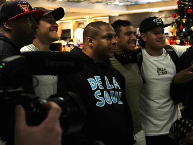 Naughty By Nature's Vin Rock greets fans after arriving at Darwin airport ahead of a show at the Discovery nightclub on Sunday. Picture: Jason Walls