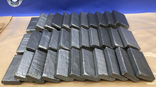 Some of the bricks of cocaine police say were found wrapped within the packages. Picture: AFP