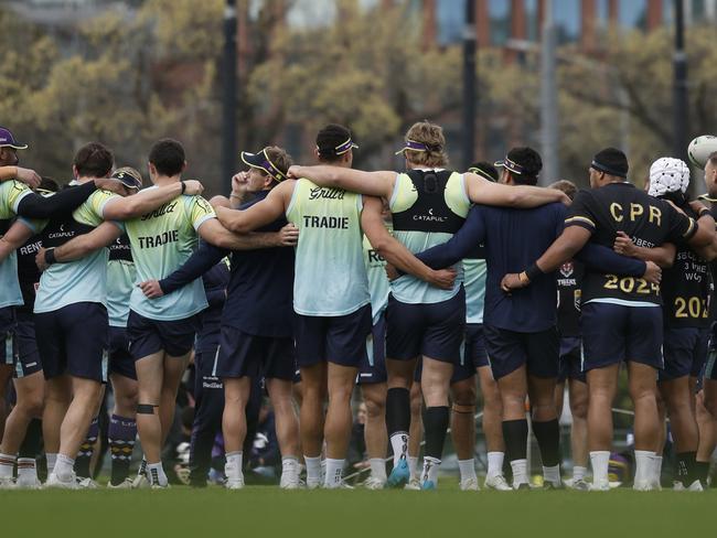 MELBOURNE, AUSTRALIA - SEPTEMBER 22: Storm players huddle during a Melbourne Storm NRL training session at Gosch's Paddock on September 22, 2024 in Melbourne, Australia. (Photo by Daniel Pockett/Getty Images)