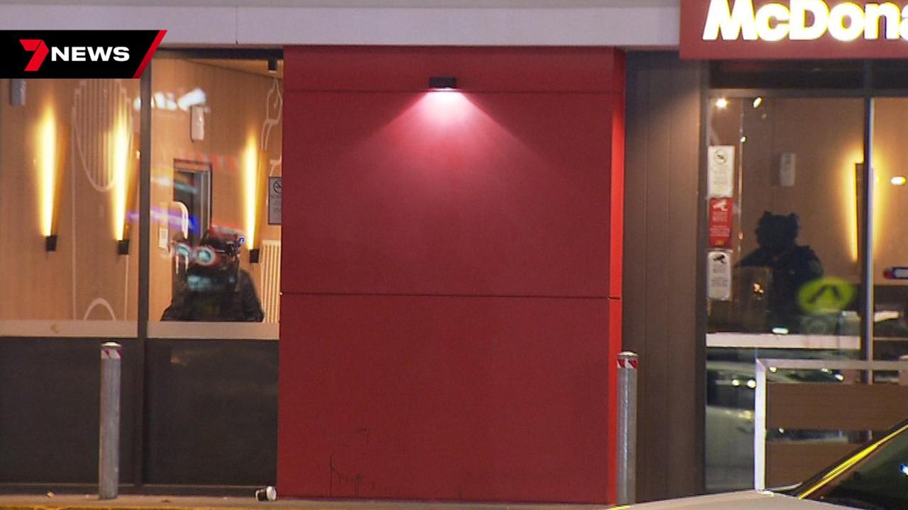 Bomb squad officers sweep the Macca’s. Picture: 7NEWS Adelaide