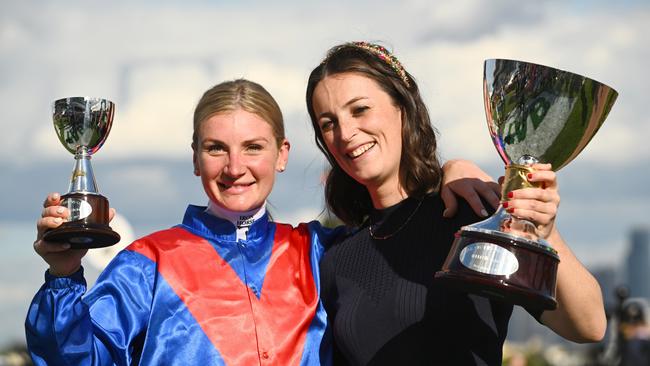 MELBOURNE, AUSTRALIA - NOVEMBER 05: Jamie Kah and Trainer Annabel Neasham pose with the champions trophy after Zaaki won Race 8, the Tab Champions Stakes, during 2022 TAB Champions Stakes Day at Flemington Racecourse on November 05, 2022 in Melbourne, Australia. (Photo by Vince Caligiuri/Getty Images)