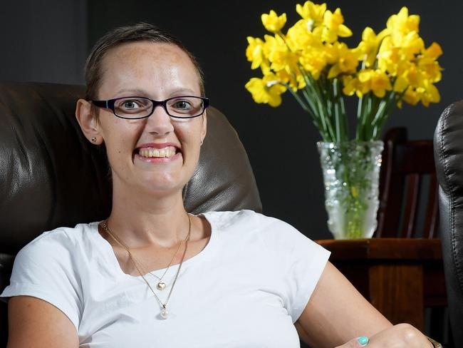 Cancer survivor Charlene Ericson poses for a photo at her home ahead of today's national Daffodil Day.Picture: Justin Kennedy