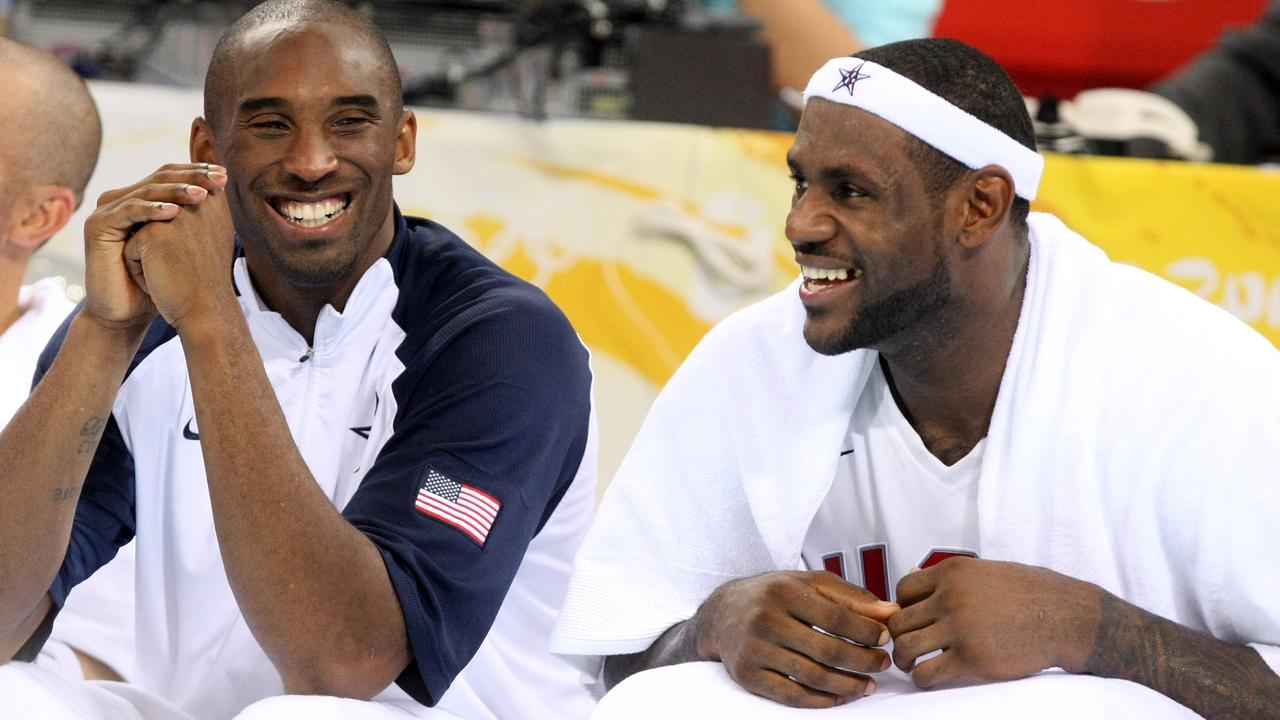 Kobe Bryant and LeBron James share a laugh on the bench on day 12 of the 2008 Beijing Olympics when Australia played the US in the quarterfinals.