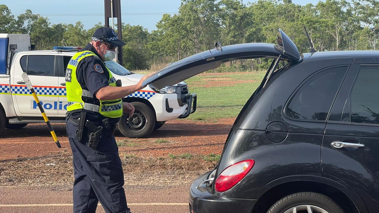 NT Police conduct vehicle checks after reports multiple people broke out of the Howard Springs quarantine facility in the early hours of Wednesday morning. Picture: Amanda Parkinson