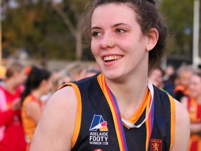 Astrid Gooley after her premiership win with SMOSH West Lakes last season. Picture: Brayden Goldspink