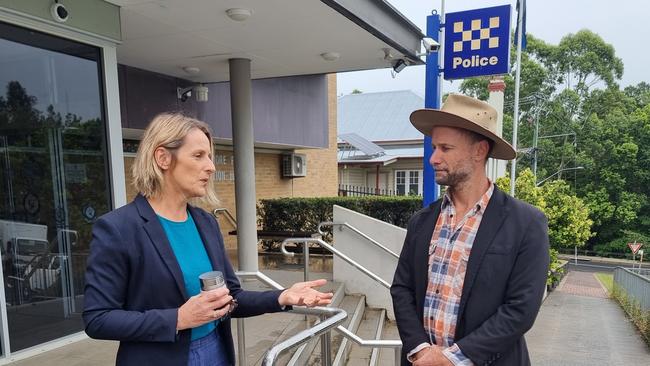 Greens MP Sue Higginson and Greens candidate for Lismore Adam Guise outside Lismore Police station.