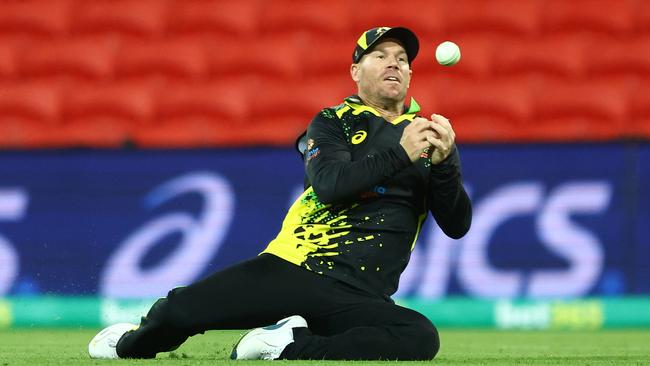 David Warner of Australia drops a catch during game one of the T20 International series between Australia and the West Indies at Metricon Stadium.