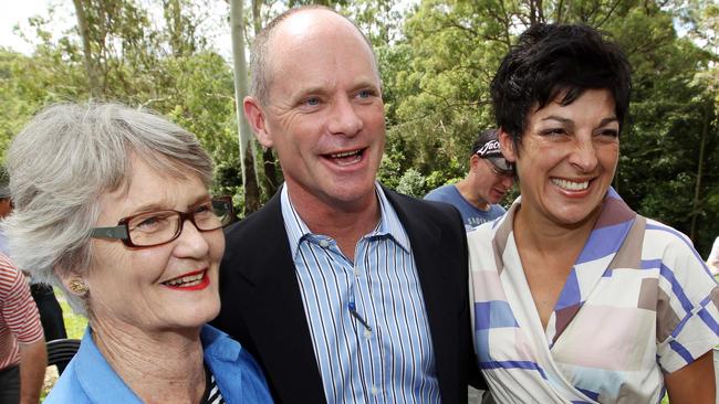 Campbell Newman shares a laugh with his mother Jocelyn Newman and wife Lisa.