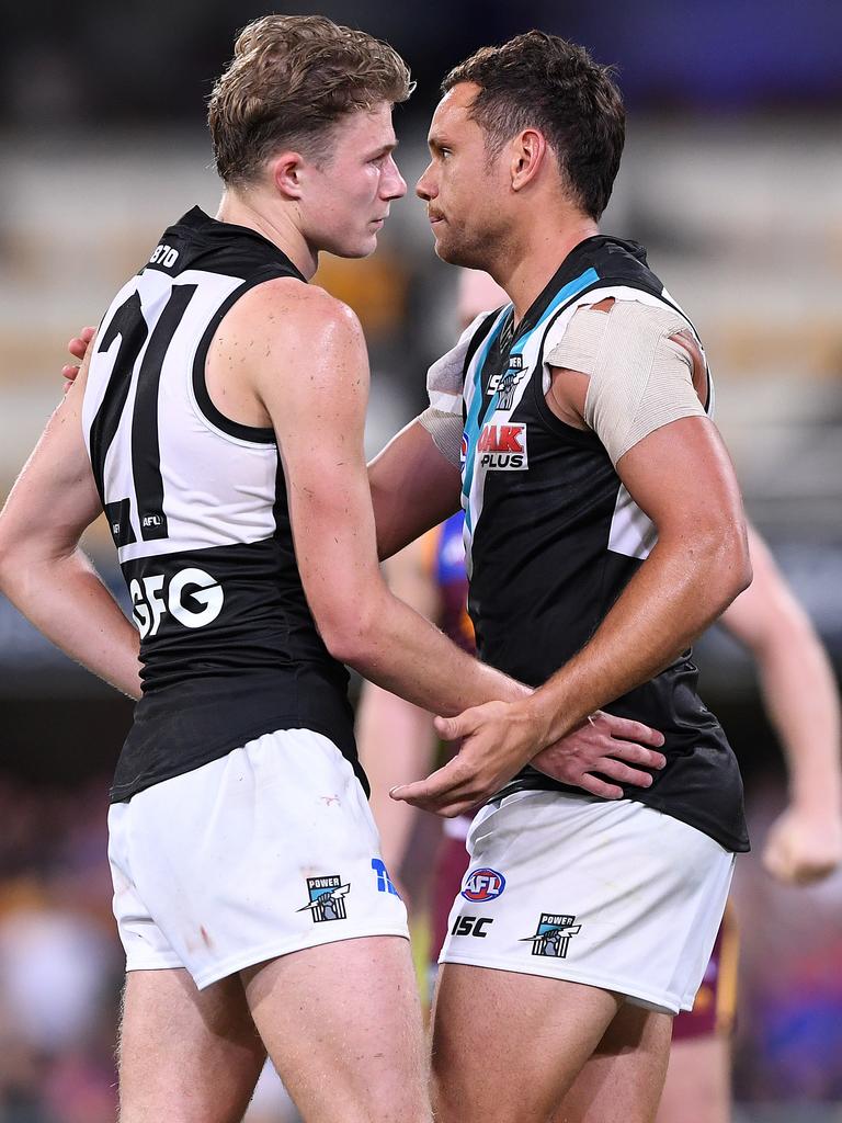 Xavier Duursma (left) and Steven Motlop at the Gabba in Brisbane on Saturday. Picture: AAP