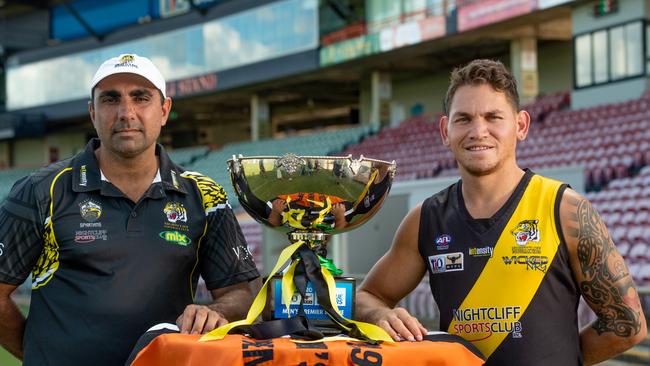 Nightcliff coach Chris Baksh and captain Phillip Wills with the NTFL Premiership Cup. Picture: Che Chorley