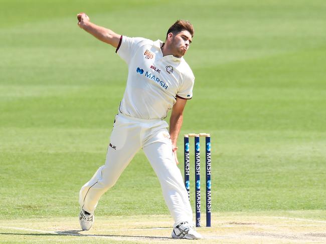 Bartlett bowls on Sheffield Shield debut for Queensland earlier this month. Picture: AAP Image/Albert Perez