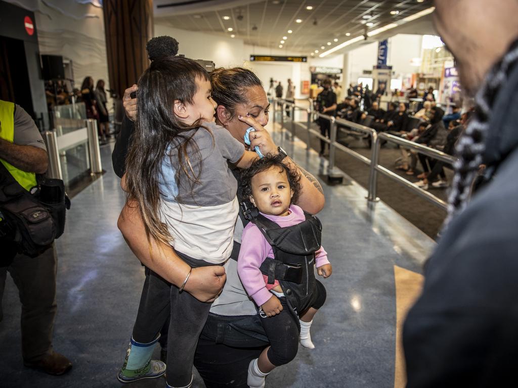 Families and friends reunited at Auckland Airport as the bubble began. Picture: Michael Craig/New Zealand Herald