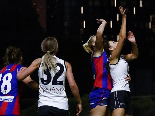 MELBOURNE, AUSTRALIA - APRIL 30: Kate Dudley of Port Melbourne and Maddy Hendrie of Carlton (C) contest the ruck during the round six VFL match between Port Melbourne and Carlton at ETU Stadium on April 30, 2023 in Melbourne, Australia. (Photo by Daniel Pockett/AFL Photos/via Getty Images)