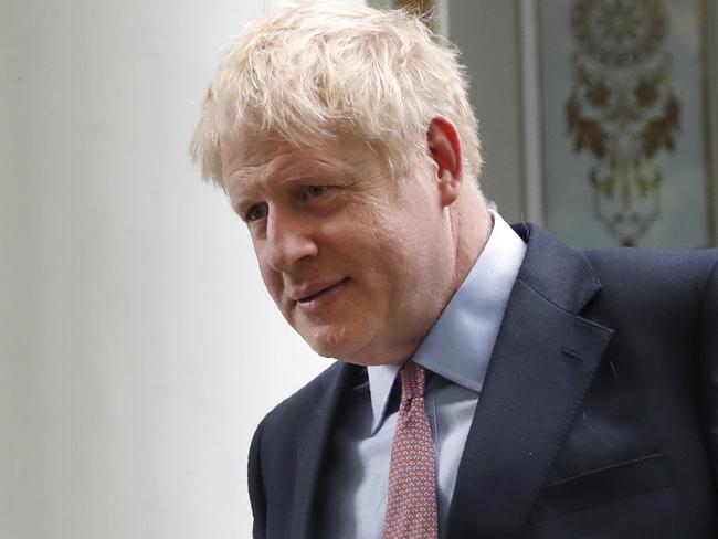 British Conservative party lawmaker Boris Johnson leaves home in south London, Friday, June 14, 2019.  Johnson is a leading candidate in the Conservative Party leadership campaign to be the next British Prime Minister. (AP Photo/Alastair Grant)