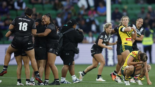 New Zealand celebrate winning as Australia look dejected after the women's Pacific Championship match between Australia Jillaroos and New Zealand Kiwi Ferns at AAMI Park on October 28, 2023 in Melbourne, Australia. (Photo by Daniel Pockett/Getty Images)