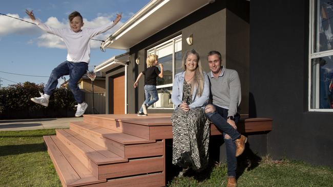 Lee and Leea Harvey, with Lennox, 8, and Loki, 7, in Barrack Point, Illawarra, where prices are up 12 per cent for the year. Picture: Simon Bullard