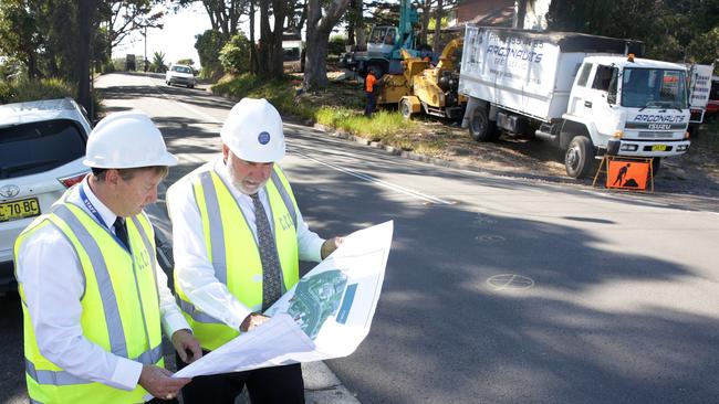 Council’s senior manager of Roads and Drainage Boris Bolgoff and Mike Dowling, group leader of assets, infrastructure and business out the front of The Cowrie restaurant today as the upgrade begins. Picture: Mark Scott