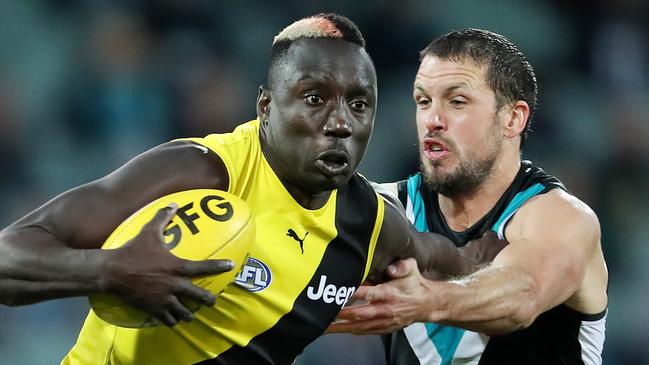 Mabior Chol in action during Saturday night’s match with Port Adelaide. Picture: Sarah Reed