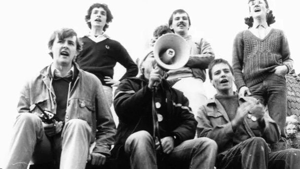 Albanese, left, leads a student protest atop the University of Sydney clock tower in 1983.