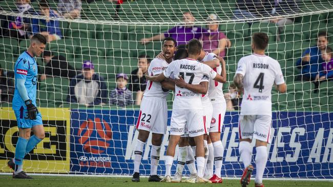 The Western Sydney Wanderers celebrate a goal during the Round 1 A-League match against Perth Glory.