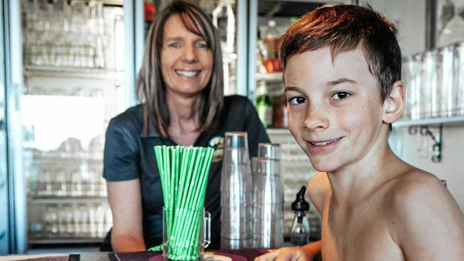 ENVIRONMENT ALLY FRIENDLY: Tannum Sands Surf Club's Marisa Kent with Sid Crawshaw, 10, whose plastic-free campaign prompted the club to ban plastic straws. Picture: Hayley Bracewell Photography