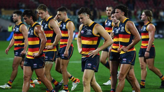 Dejected Crows leave the ground after their latest defeat. Picture: Mark Brake/Getty Images